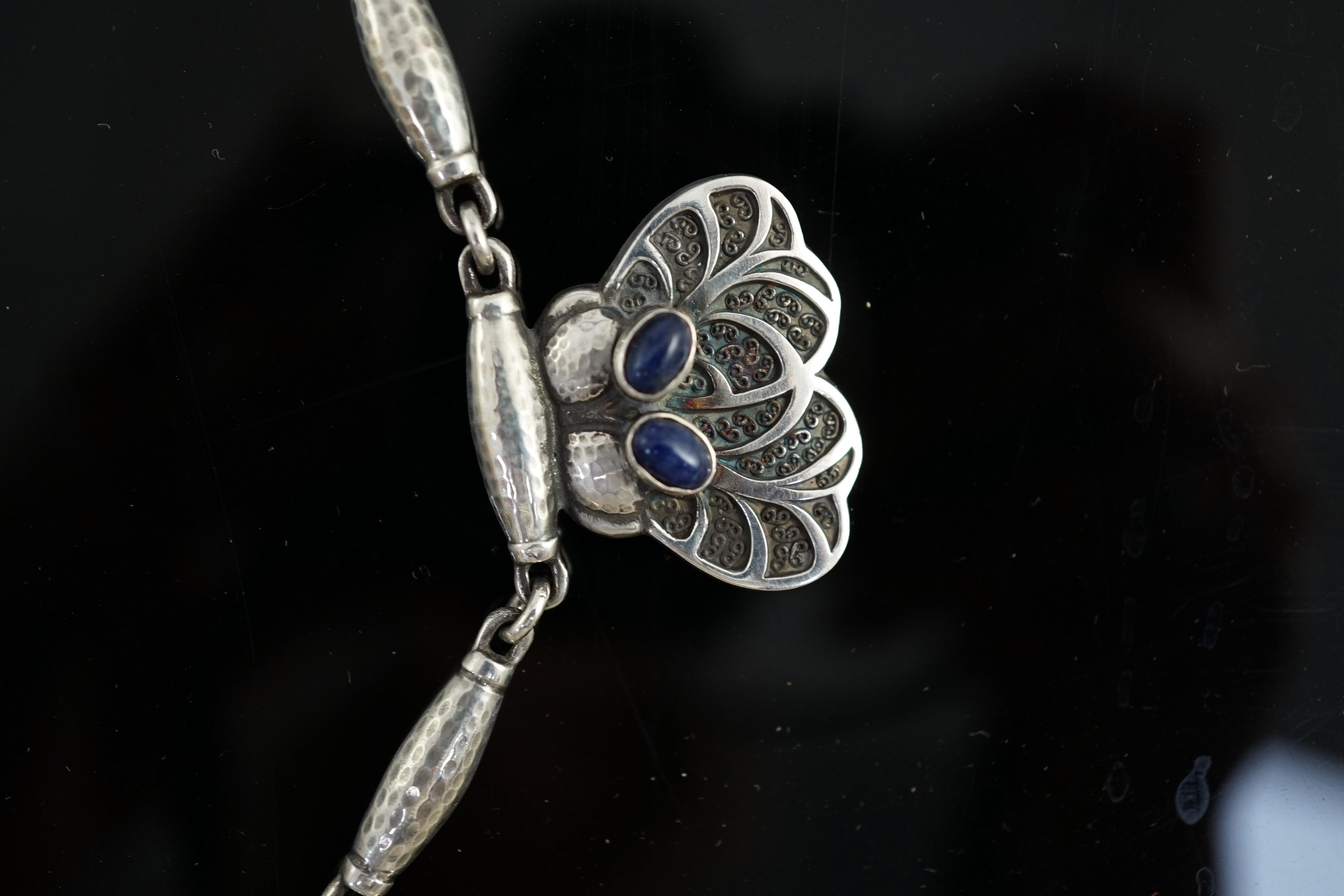 A Georg Jensen planished sterling silver and cabochon blue quartz set necklace, design no. 4